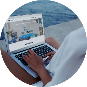 Picture of a man relaxing while being on the laptop