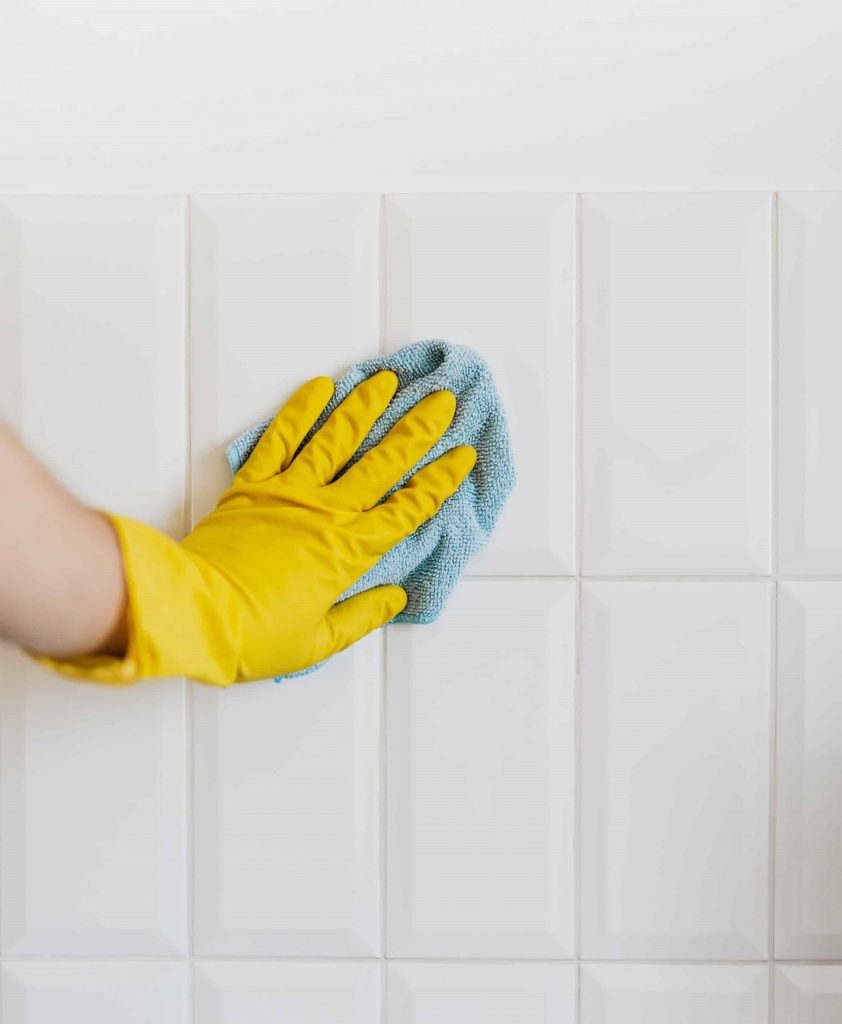 Picture of a hand cleaning a surface